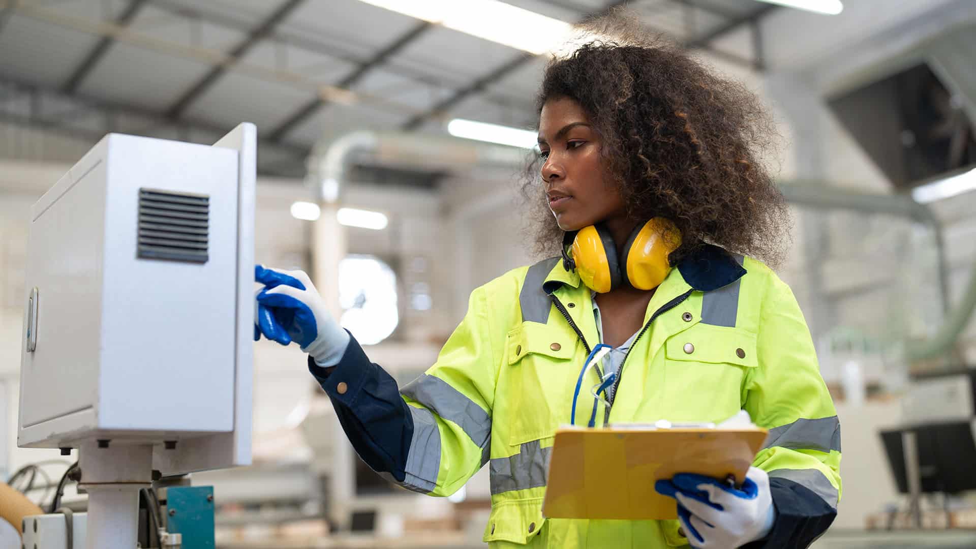 African American woman engineer using computer