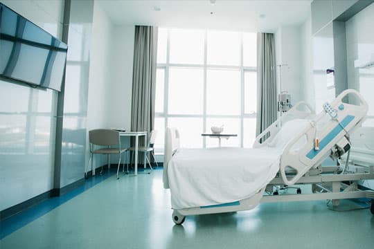 Hospital bed and room