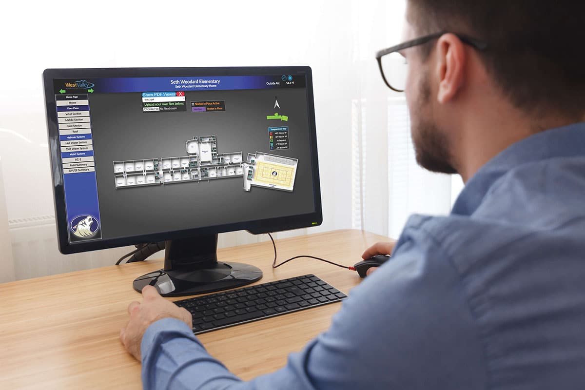 Engineer looking at computer screen